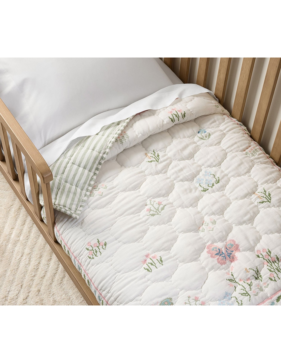 Cobija de tejido plagrace›s garden para niña